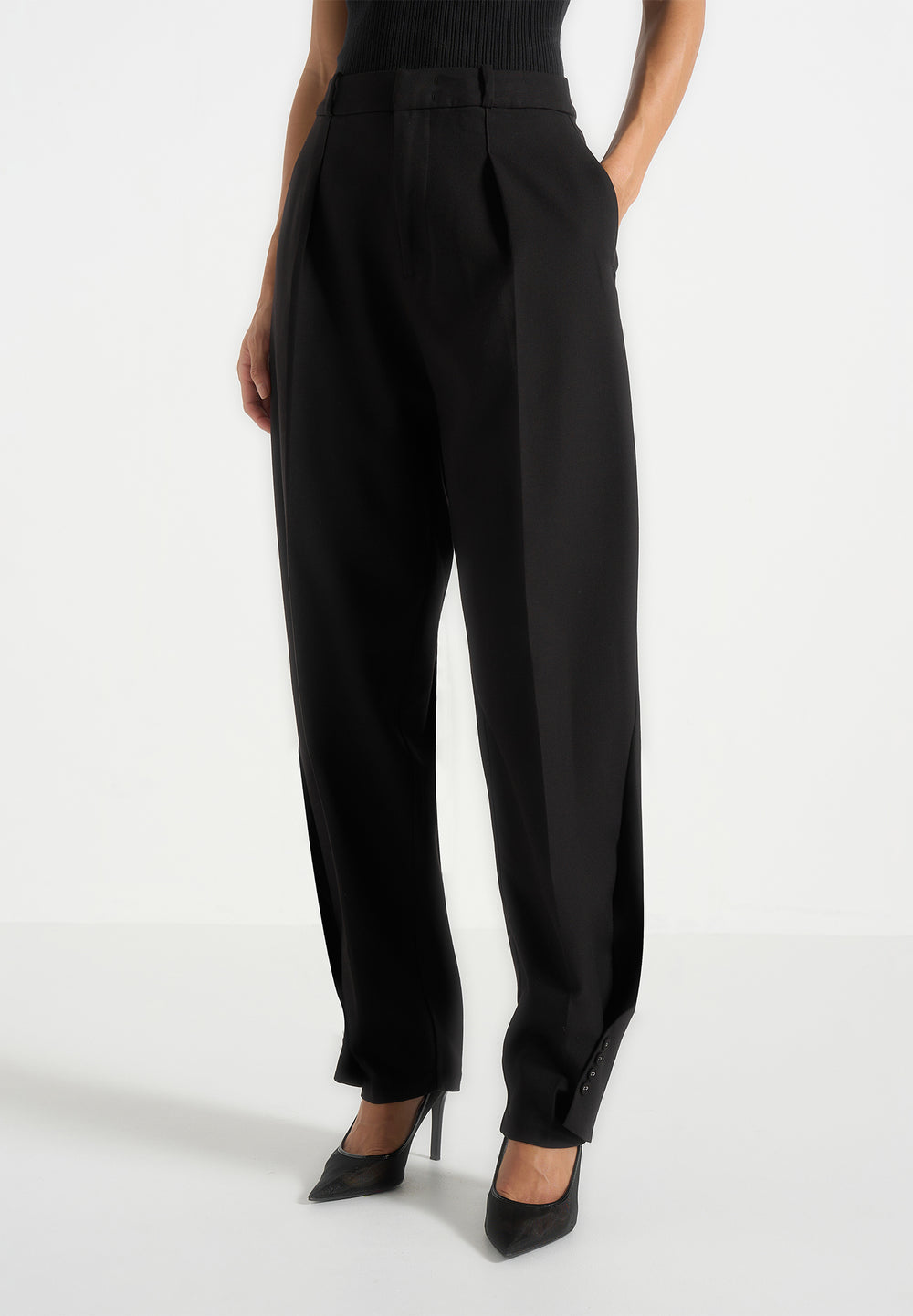 Twist leg tailored trousers in black
